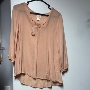 Woman peach blouse